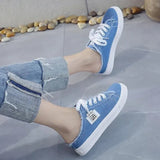 Women’s Frayed Denim Mule Sneakers